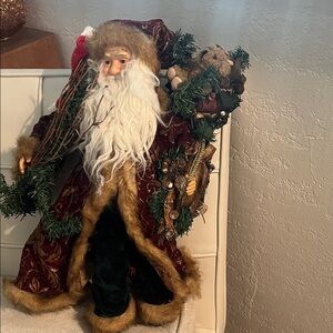 Festive Santa Claus Holiday Figurine with Red and Green Accents